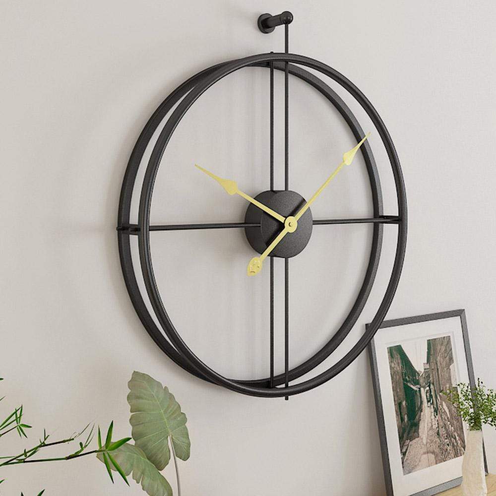 A stylish 20-inch black metal analog clock with a silver frame, showcasing a modern and simplistic design, perfect for home decor.