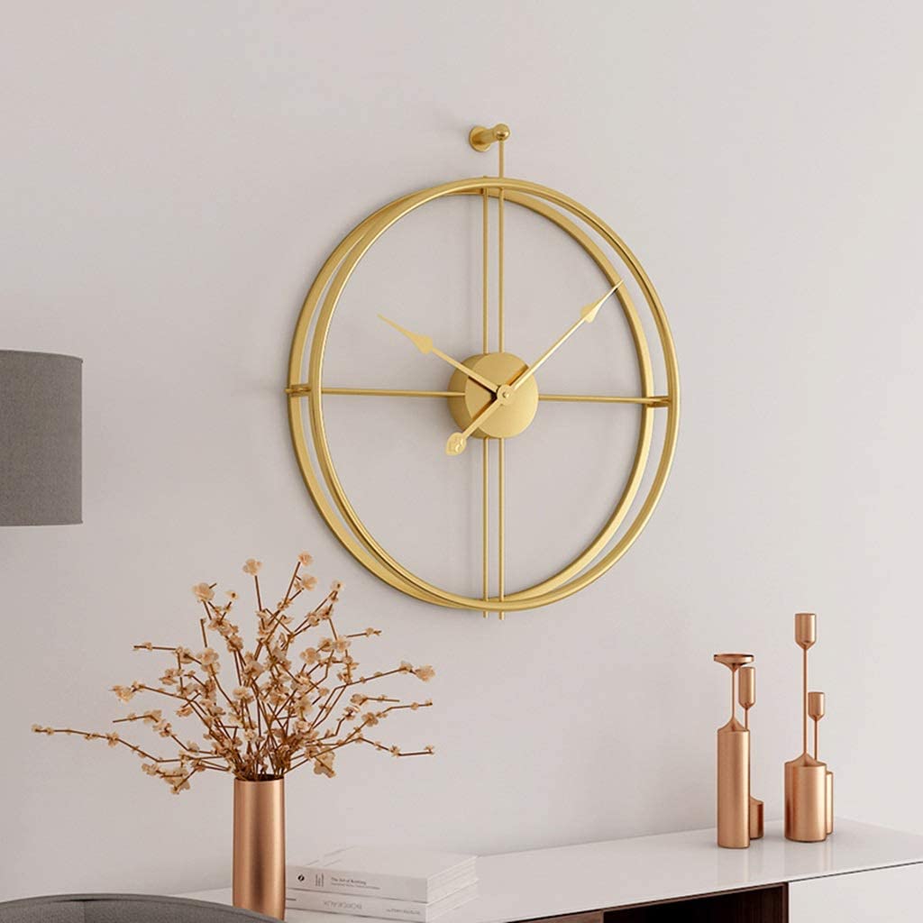 A stylish 20-inch black metal analog clock with a silver frame, showcasing a modern and simplistic design, perfect for home decor.