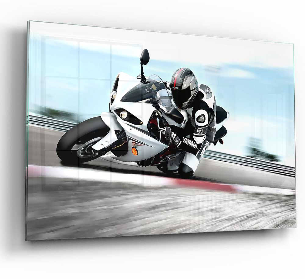 A modern glass print featuring the 2009 Yamaha Yzf R1 motorcycle, showcasing its sleek design and vibrant colors.