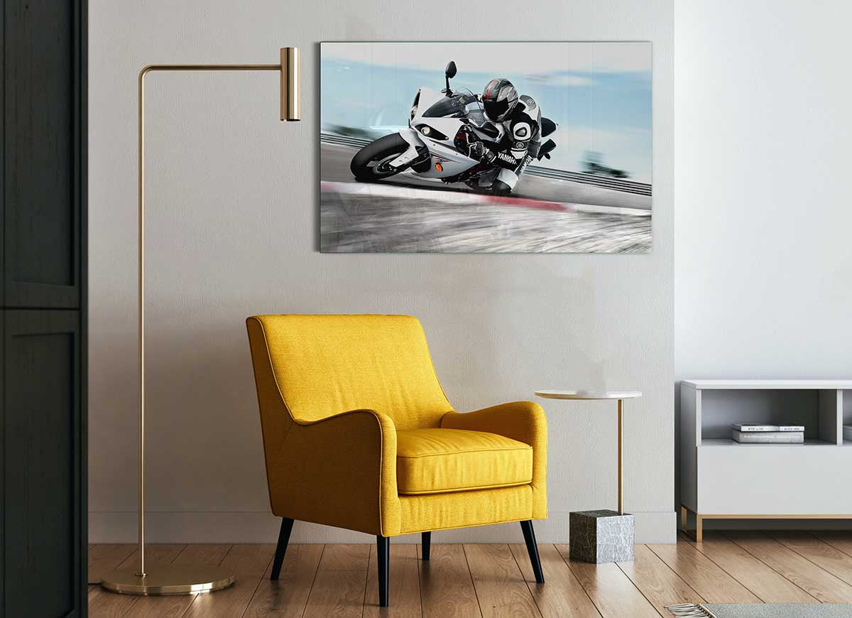 A modern glass print featuring the 2009 Yamaha Yzf R1 motorcycle, showcasing its sleek design and vibrant colors.