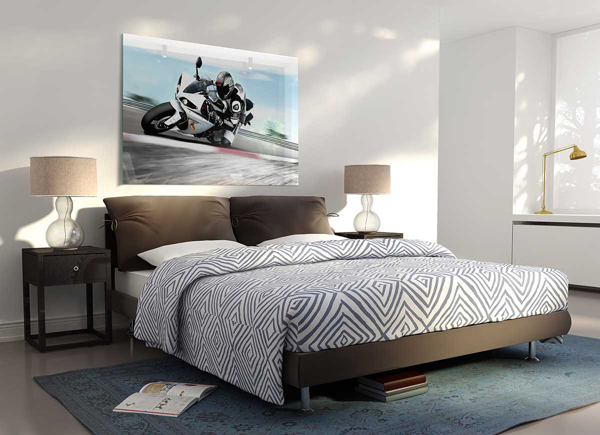 A modern glass print featuring the 2009 Yamaha Yzf R1 motorcycle, showcasing its sleek design and vibrant colors.