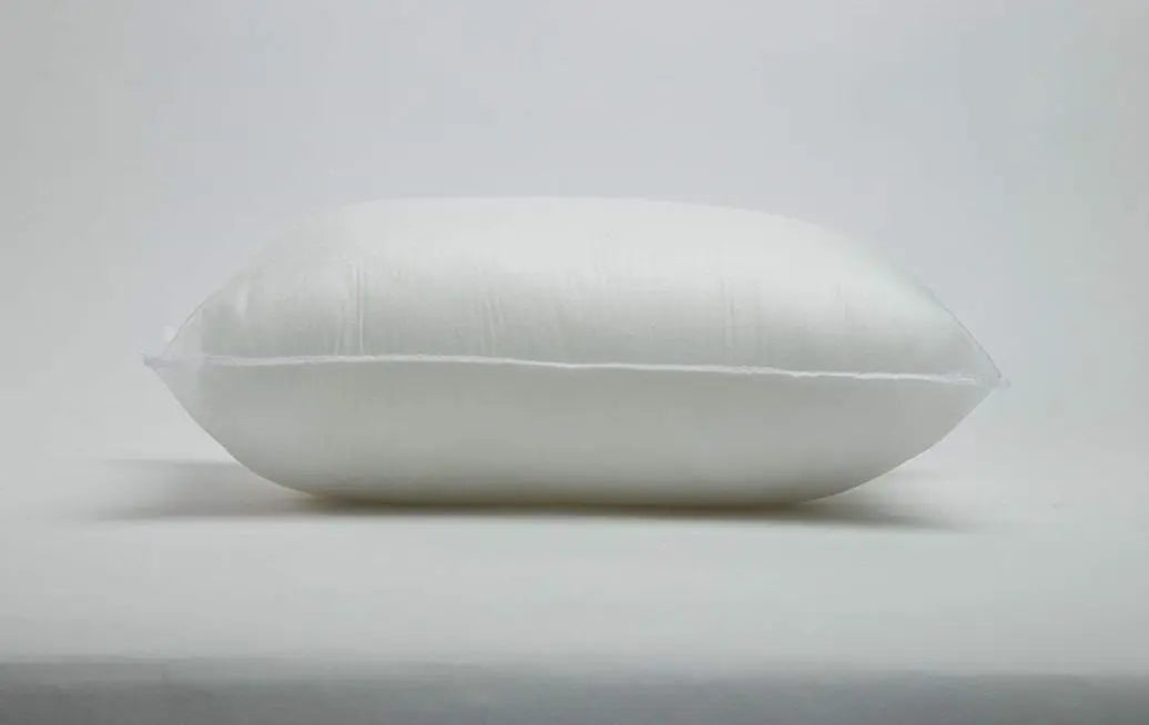 20x10 or 10x20 hypoallergenic polyester pillow insert, showcasing its plush filling and durable cotton blend fabric.