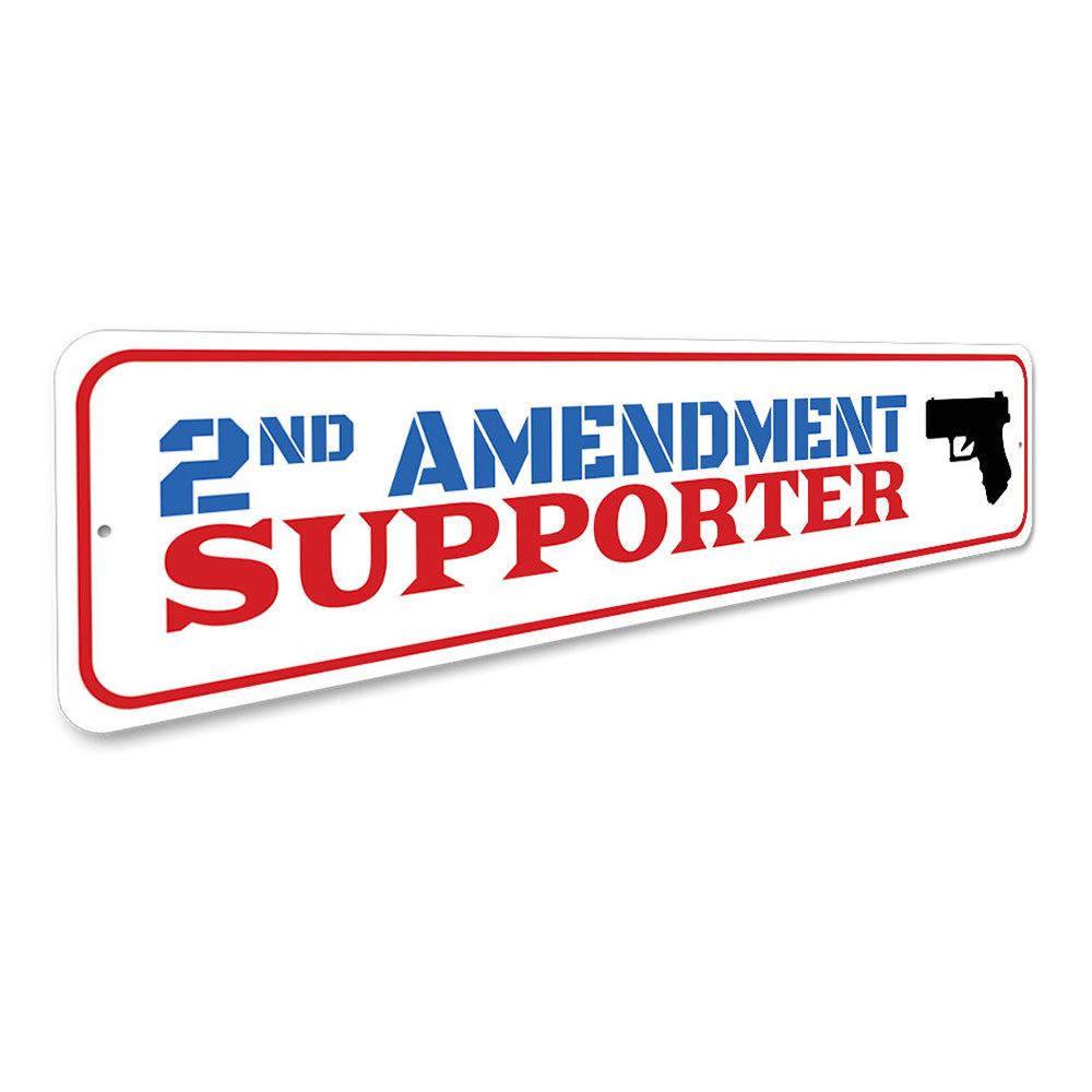 A decorative 2nd Amendment Supporter Sign made of aluminum, featuring bold text and a stylish design, suitable for indoor and outdoor display.