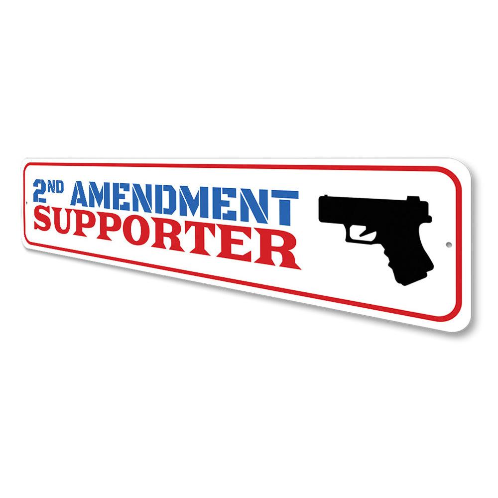 A decorative 2nd Amendment Supporter Sign made of aluminum, featuring bold text and a stylish design, suitable for indoor and outdoor display.