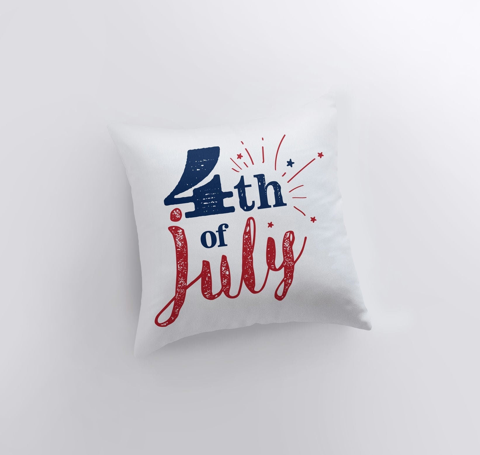 Handmade 4th of July pillow cover featuring vibrant fireworks and red star design, perfect for home decor.