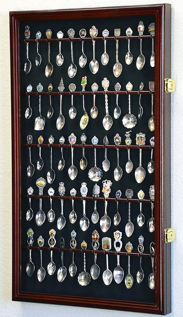 Wall-mounted cherry finish display case for spoons, featuring a black felt background and UV-coated plexiglass door.