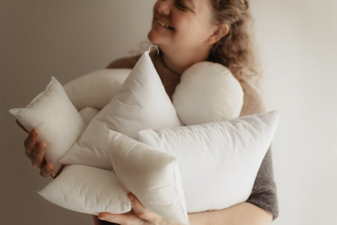 A 6x9 or 9x6 hypoallergenic polyester pillow insert, showcasing its plush and soft texture, ideal for indoor and outdoor use.