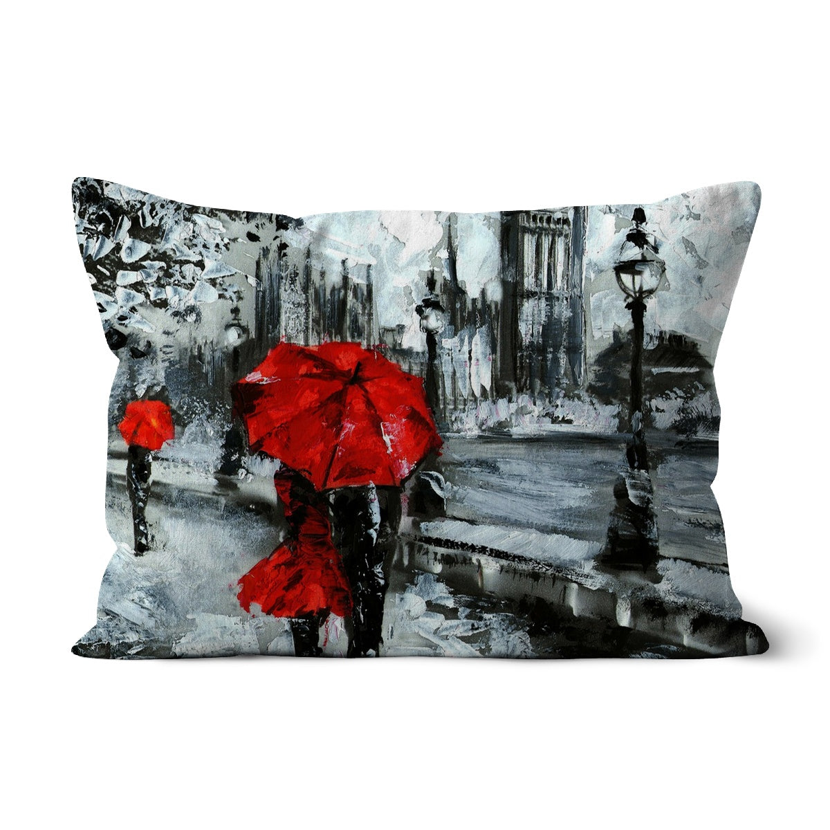 A decorative cushion featuring a couple against a backdrop of iconic London architecture, showcasing vibrant colors and intricate details.