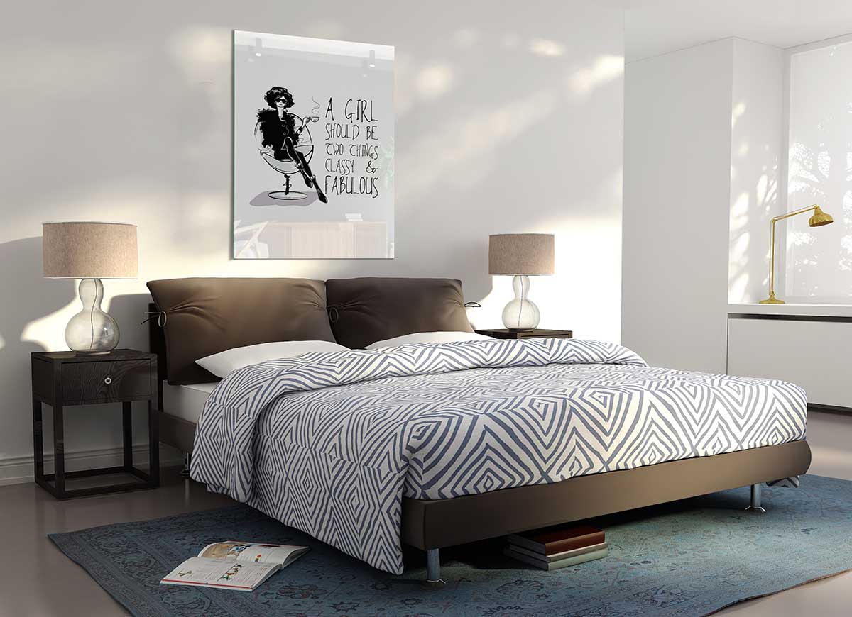 A modern glass print featuring the quote 'A Girl Should Be Two Things', showcasing elegant design and vibrant colors.