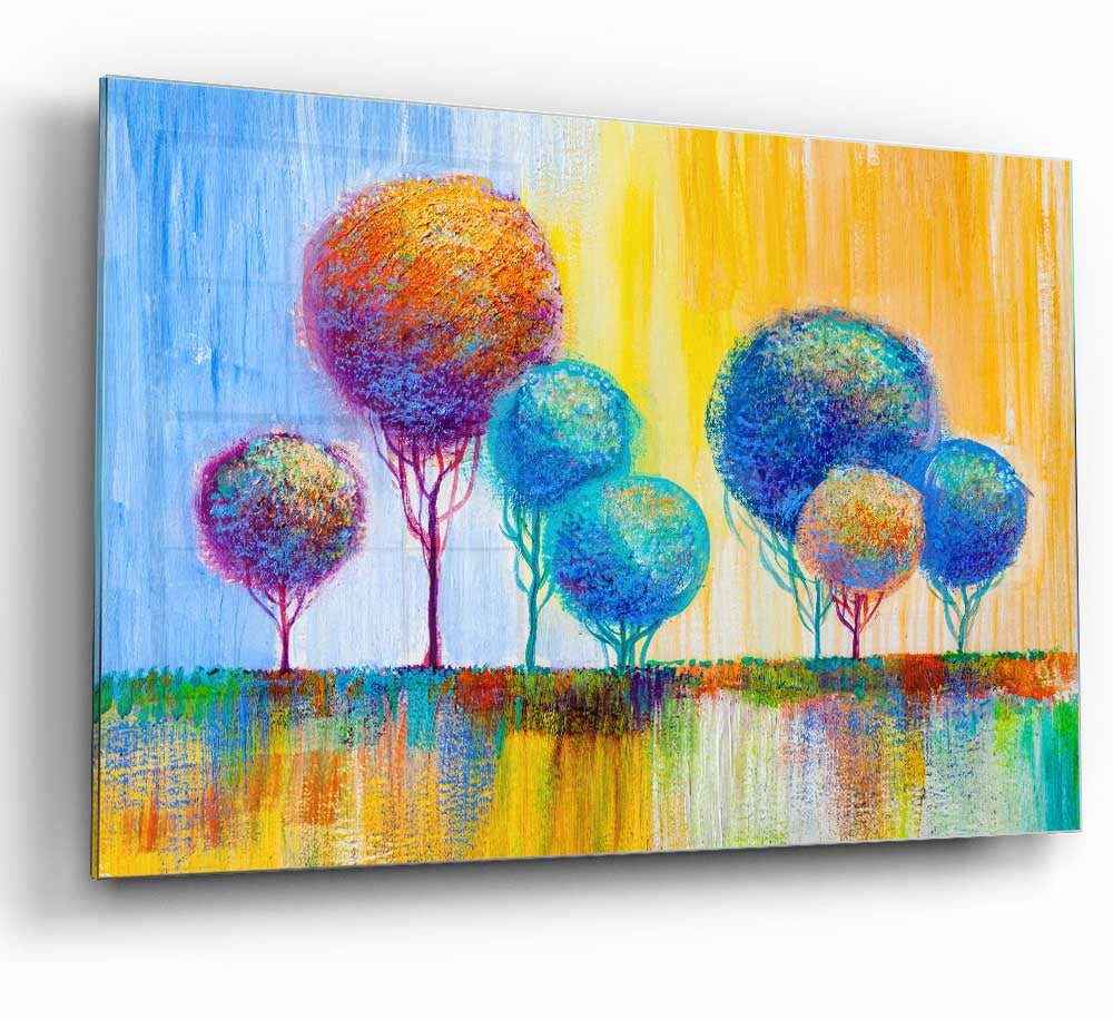 A modern glass print featuring a group of trees, showcasing vibrant colors and intricate details, perfect for home decor.