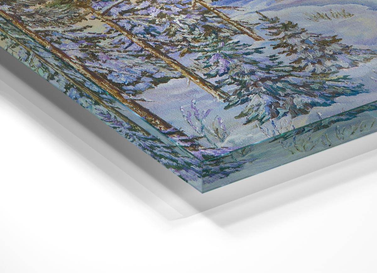 A stunning glass print featuring a serene snow-filled forest landscape, showcasing modern art style.