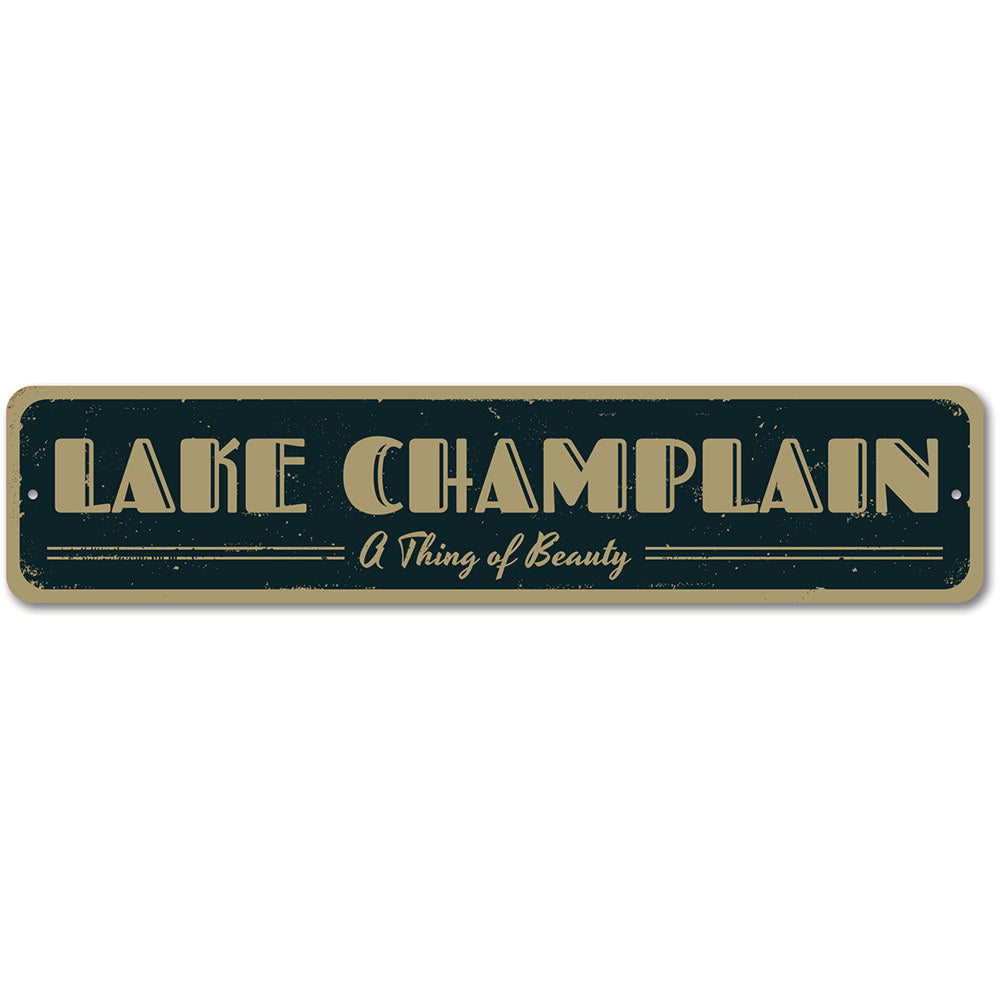 A decorative aluminum lake sign featuring the phrase 'A Thing of Beauty', showcasing a serene lakeside theme, perfect for home decor.