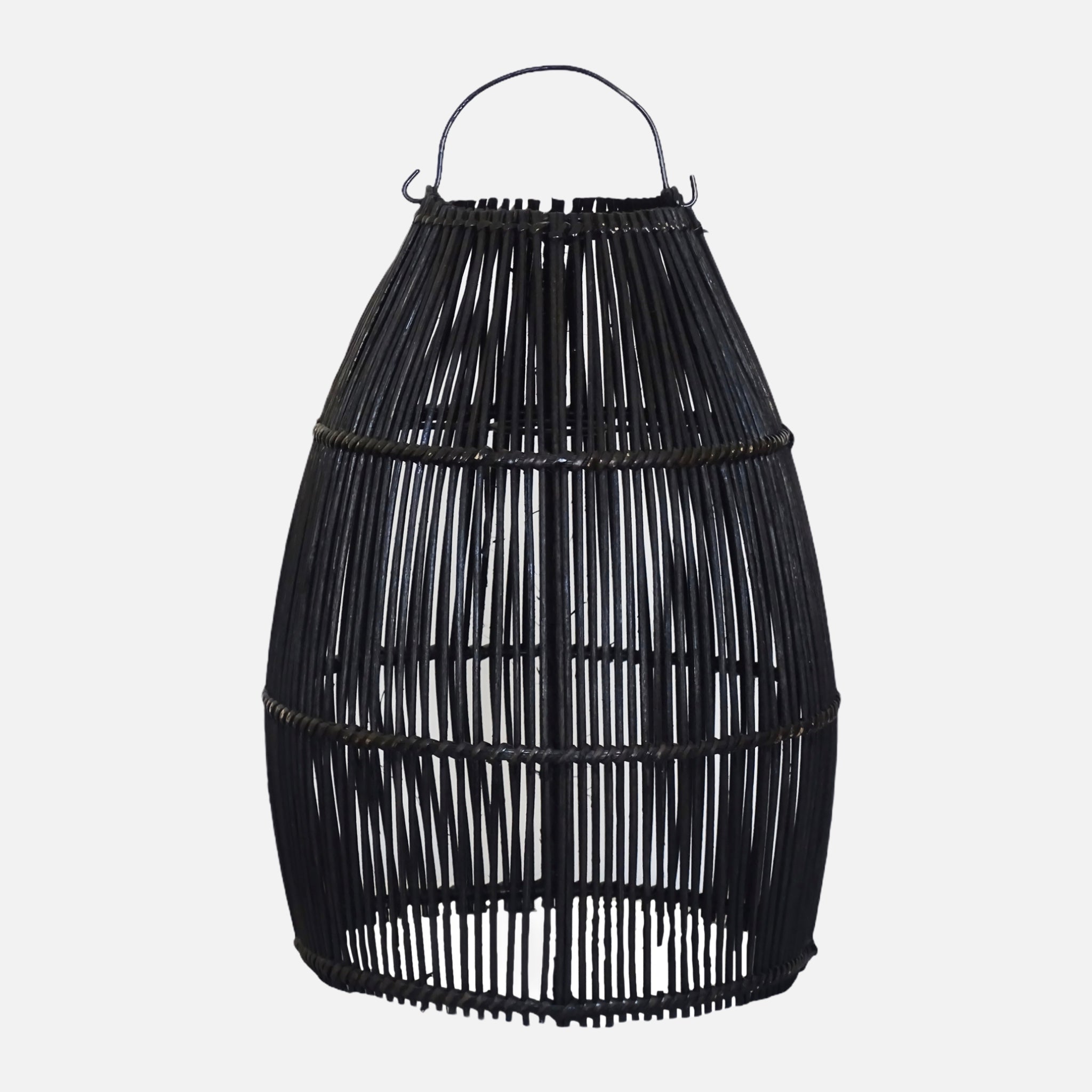 Ayana Black Rattan Lamp Shade hanging elegantly, showcasing its intricate handmade design and boho style.