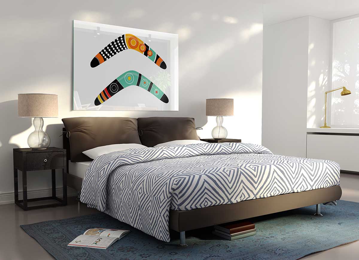 A vibrant Aboriginal Boomerang glass print showcasing intricate designs and colors, perfect for modern home decor.