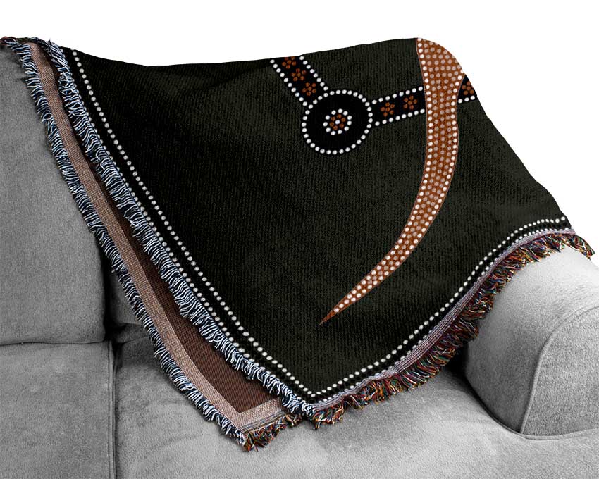 A luxurious Aboriginal Kangaroo throw blanket made from 100% cotton, featuring a thermal weave for breathability, perfect for bed or couch.