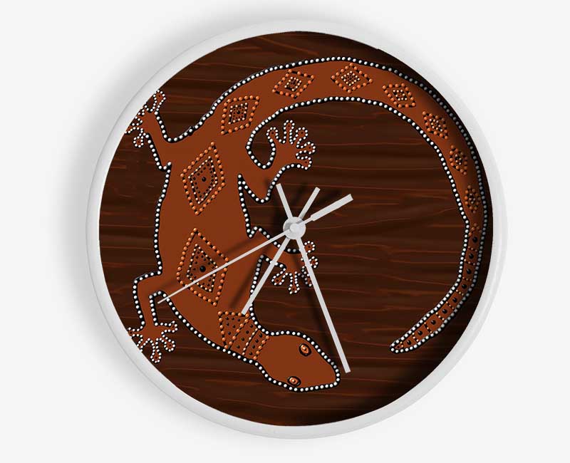 Aboriginal Lizard 2 clock made from natural bamboo with a round face and clear Plexiglas lens, available in black, white, and natural frame colors.