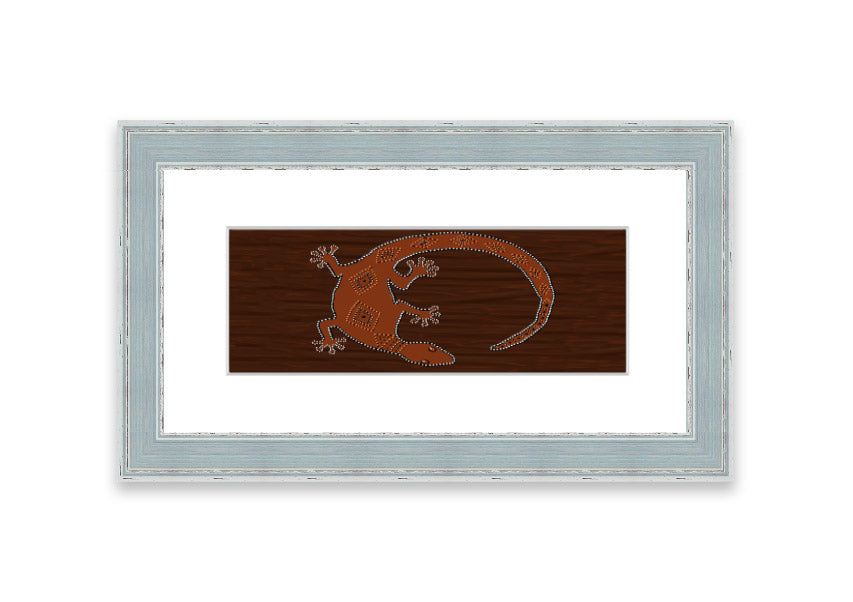 Framed Aboriginal Lizard 2 print showcasing intricate designs and vibrant colors, ready to hang.