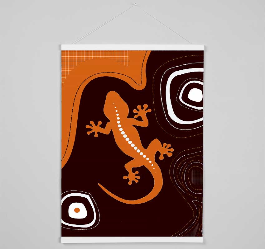 Aboriginal Lizard 3 wooden poster hanger showcasing a print with magnetic fastening and color-coordinated cords.