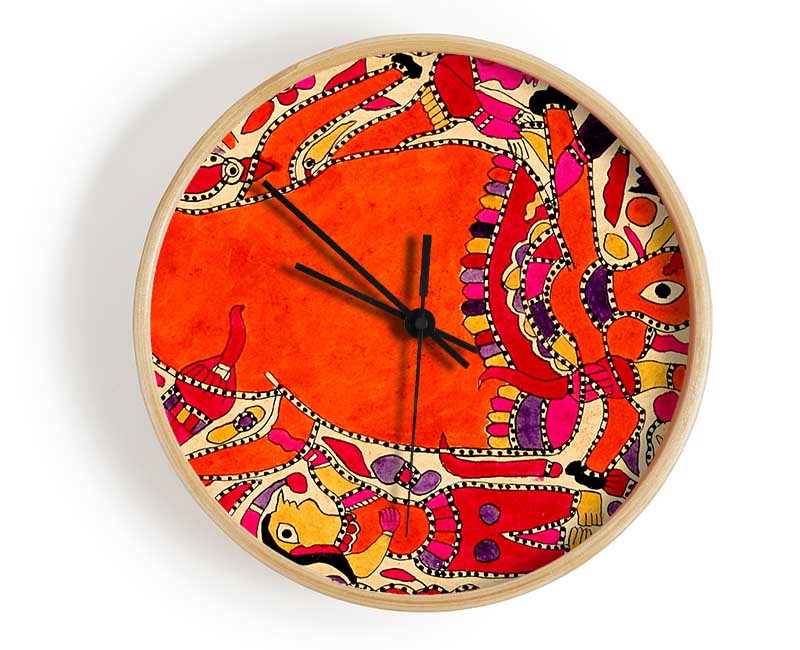 Aboriginal Madhubani clock made from natural bamboo with intricate designs, featuring a clear Plexiglas lens and available in multiple colors.