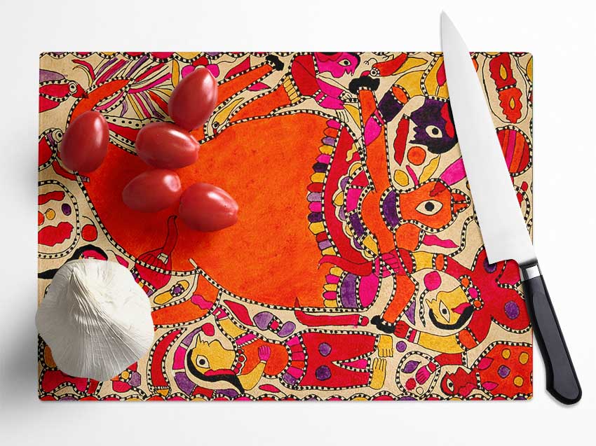 Aboriginal Madhubani chopping board made of tempered glass with chinchilla ripple effect and anti-slip feet.