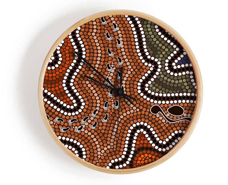 Aboriginal Pattern 5 clock made from natural bamboo with intricate designs, featuring a round face and clear Plexiglas lens.