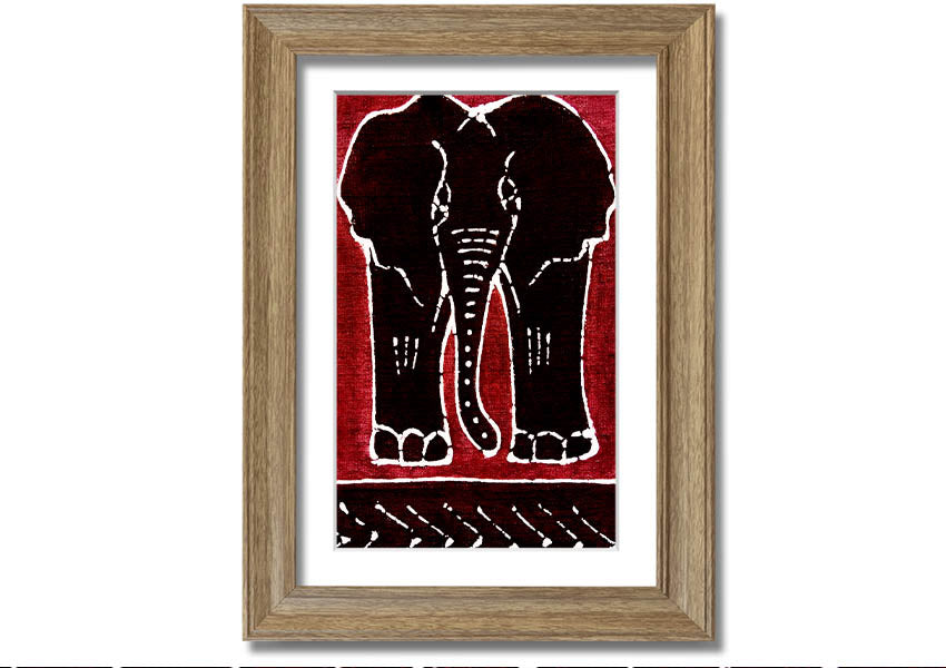 Framed print of an Aboriginal Red Elephant, showcasing vibrant colors and intricate design, ready to hang.