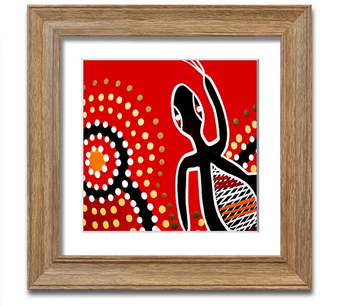 Framed print of Aboriginal Red Gecko Sun artwork, showcasing vibrant colors and intricate designs, ready to hang.