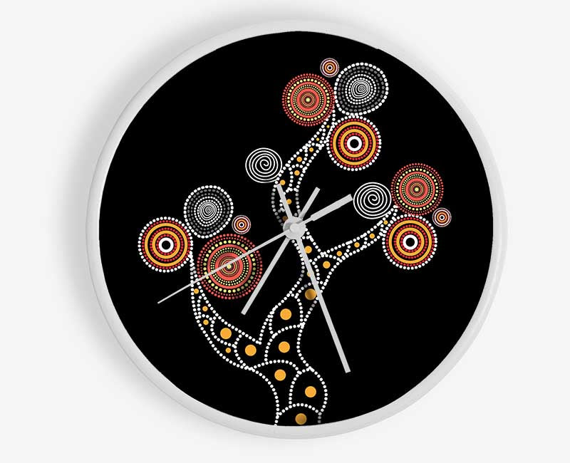 Aboriginal Tree clock made from natural bamboo with a round face and clear Plexiglas lens, available in black, white, and natural frame colors.