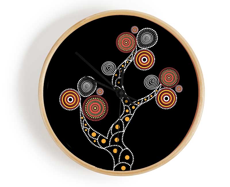 Aboriginal Tree clock made from natural bamboo with a round face and clear Plexiglas lens, available in black, white, and natural frame colors.