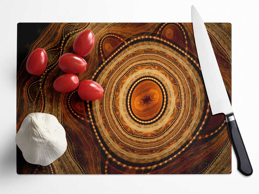 Aboriginal Tribal Power chopping board made of tempered glass with chinchilla ripple effect and anti-slip feet.