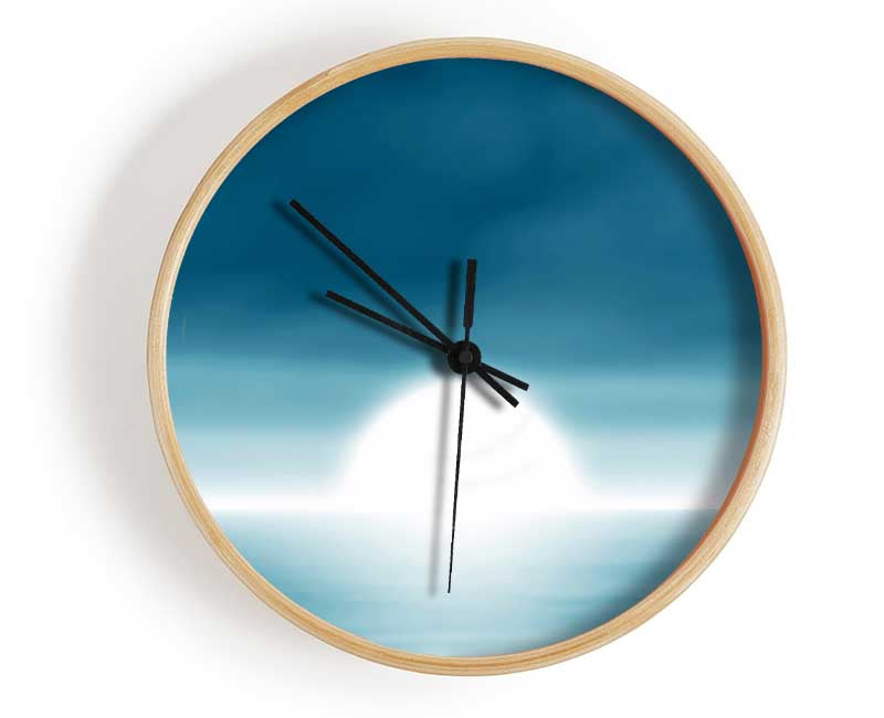 Abstract Sun Blue clock made of natural bamboo with a round face and clear Plexiglas lens, available in multiple colors.