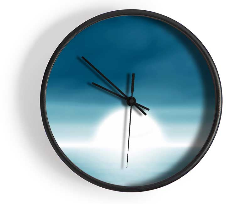 Abstract Sun Blue clock made of natural bamboo with a round face and clear Plexiglas lens, available in multiple colors.