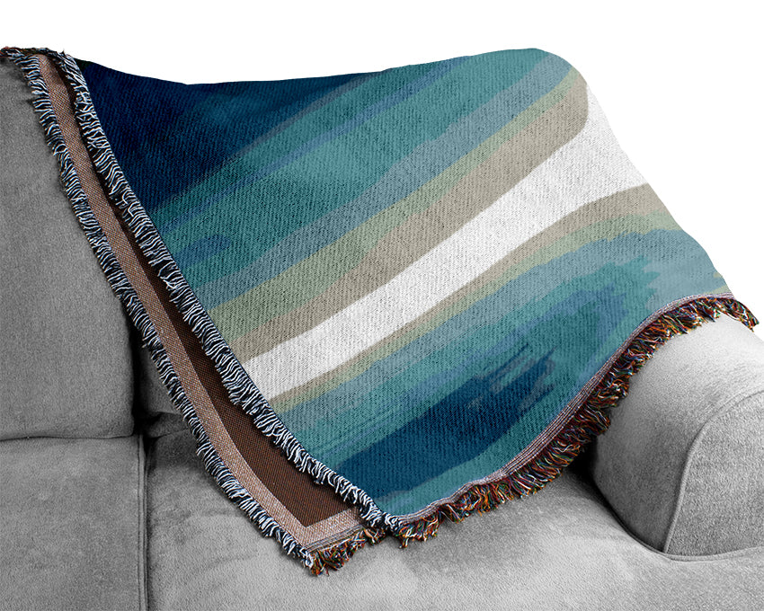 Abstract Sun Blue throw blanket made from 100% cotton, featuring a thermal weave for breathability and a stylish design in shades of blue.