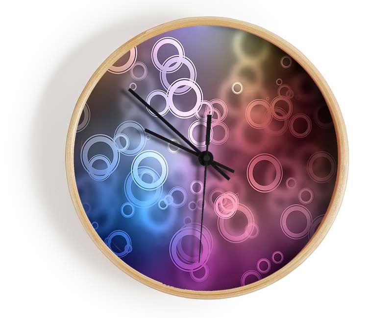 Abstract Circle Art clock made from natural bamboo with a round face and clear Plexiglas lens, available in black, white, and natural frame colors.