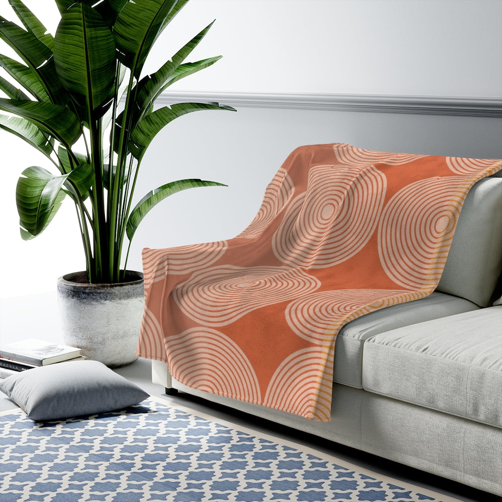 Abstract Circles Plush Blanket Throw showcasing a soft velveteen texture with a modern abstract circles design in vibrant colors.