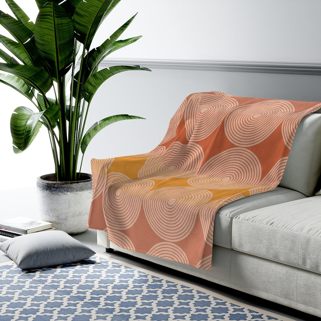 Abstract Circles Plush Blanket Throw showcasing a soft velveteen texture with a modern abstract circles design in vibrant colors.