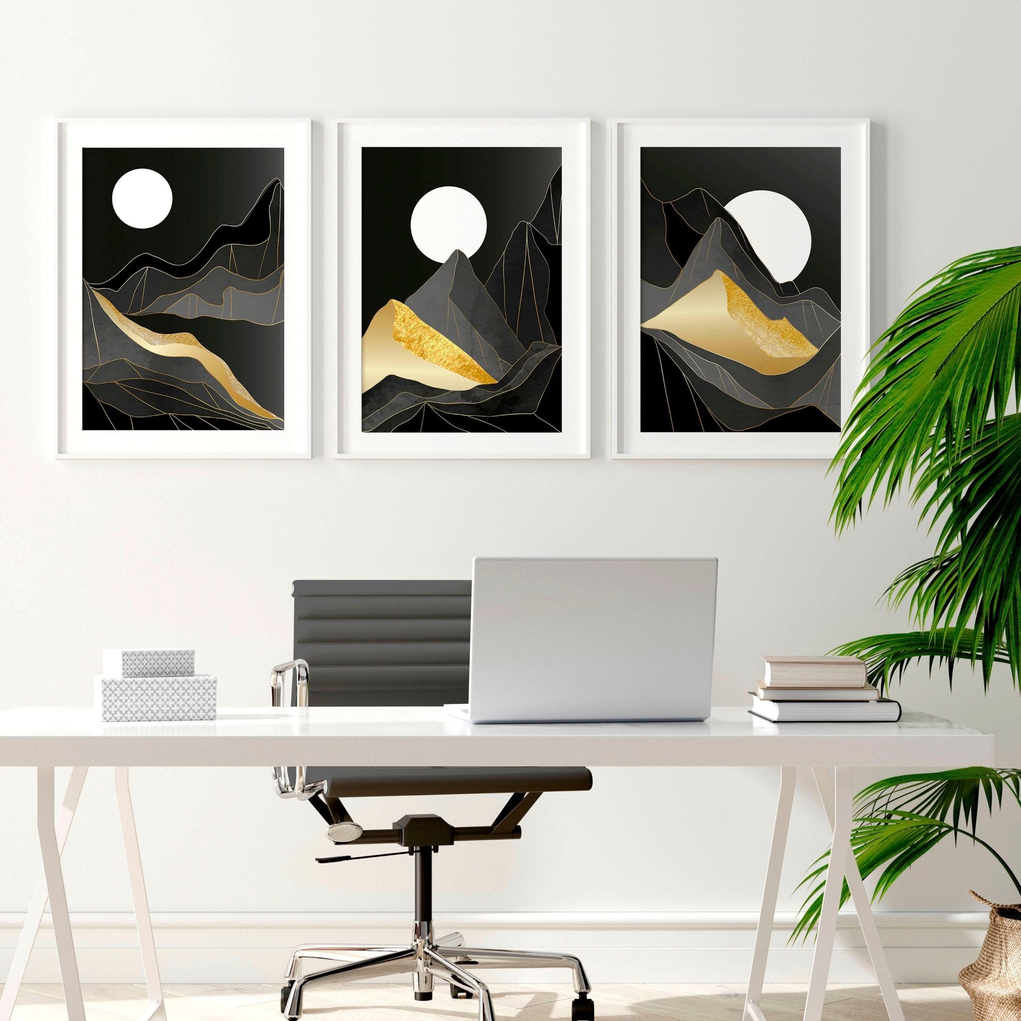 Set of 3 abstract landscape wall art prints featuring black, grey, and gold hues, perfect for modern home decor.