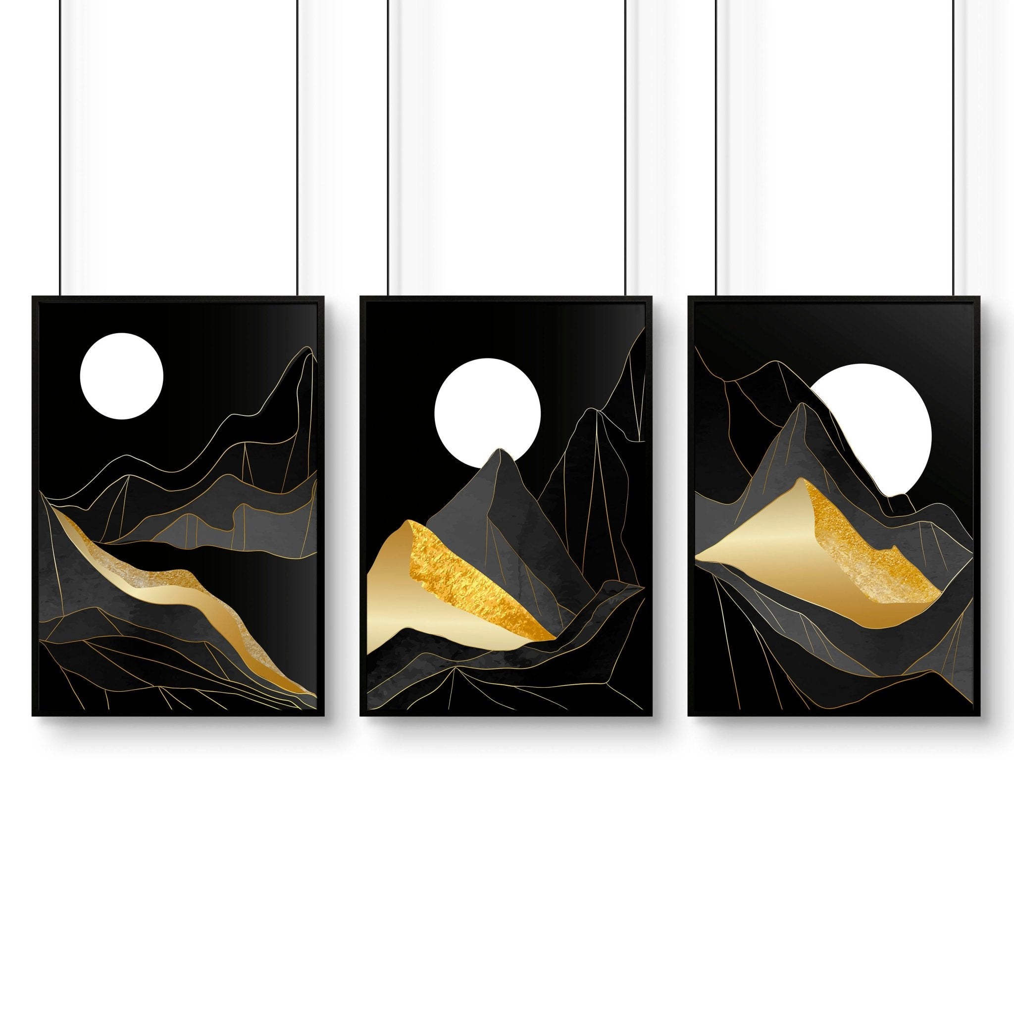 Set of 3 abstract landscape wall art prints featuring black, grey, and gold hues, perfect for modern home decor.