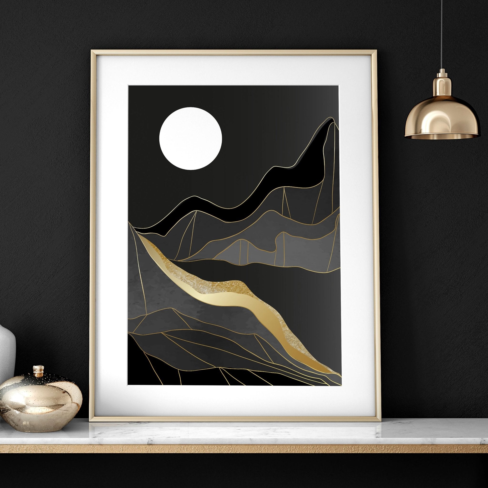 Set of 3 abstract landscape wall art prints featuring black, grey, and gold hues, perfect for modern home decor.