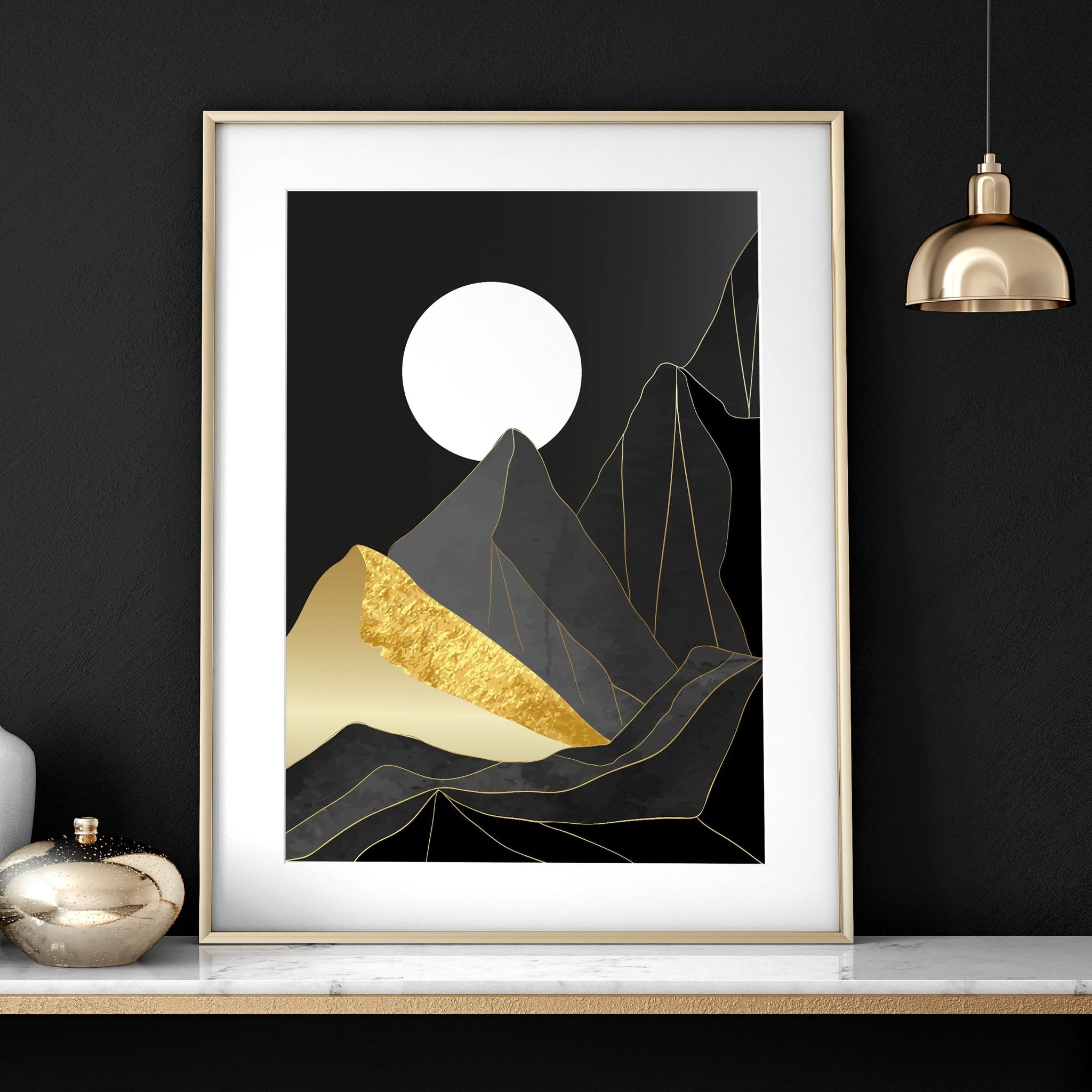 Set of 3 abstract landscape wall art prints featuring black, grey, and gold hues, perfect for modern home decor.