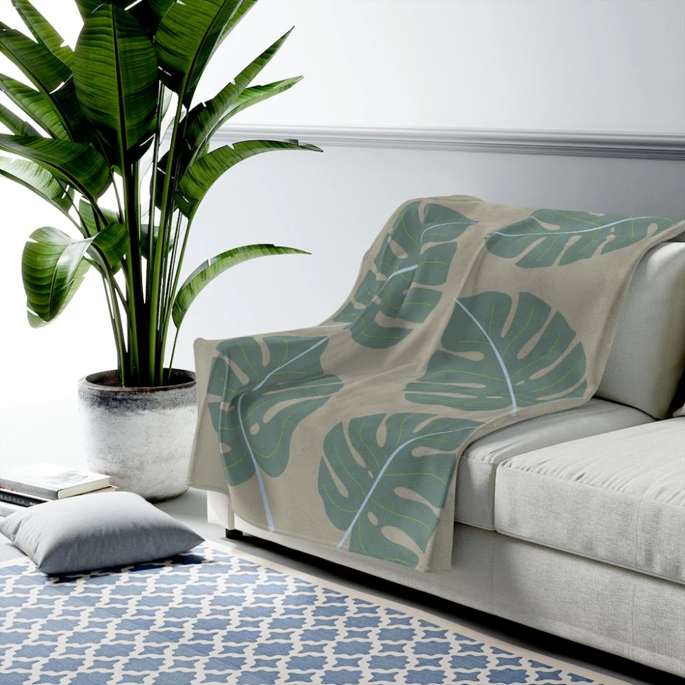 Abstract Leaves Green Plush Blanket Throw showcasing soft velveteen fabric with a stylish leaf design, perfect for cozy home decor.