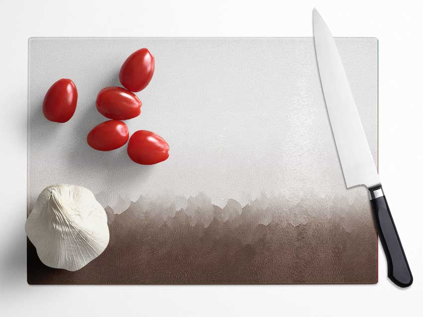 Abstract Ocean Beige On White chopping board made of tempered glass with a unique design and anti-slip feet.