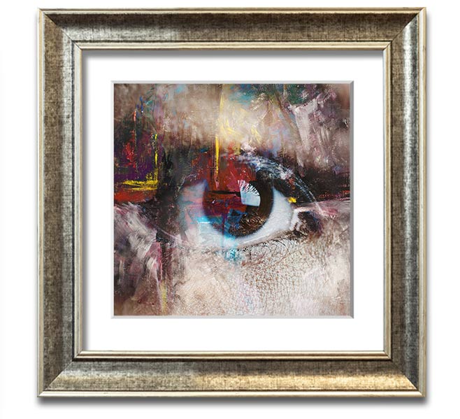 A square framed print featuring an abstract painting with an eye motif, showcasing vibrant colors and intricate details, ready to hang.