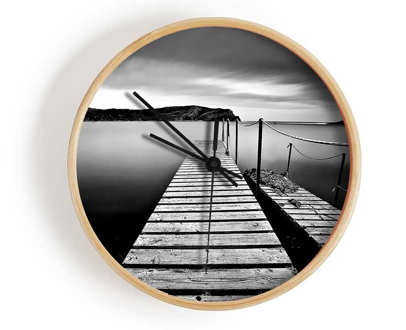 Abstract Pier B n W clock made from natural bamboo with a round face, available in black, white, and natural frame colors.