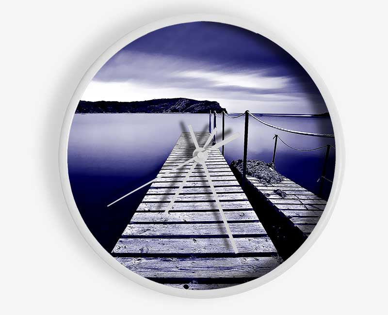 Abstract Pier Purple clock made from natural bamboo with a round face and clear Plexiglas lens, available in multiple colors.