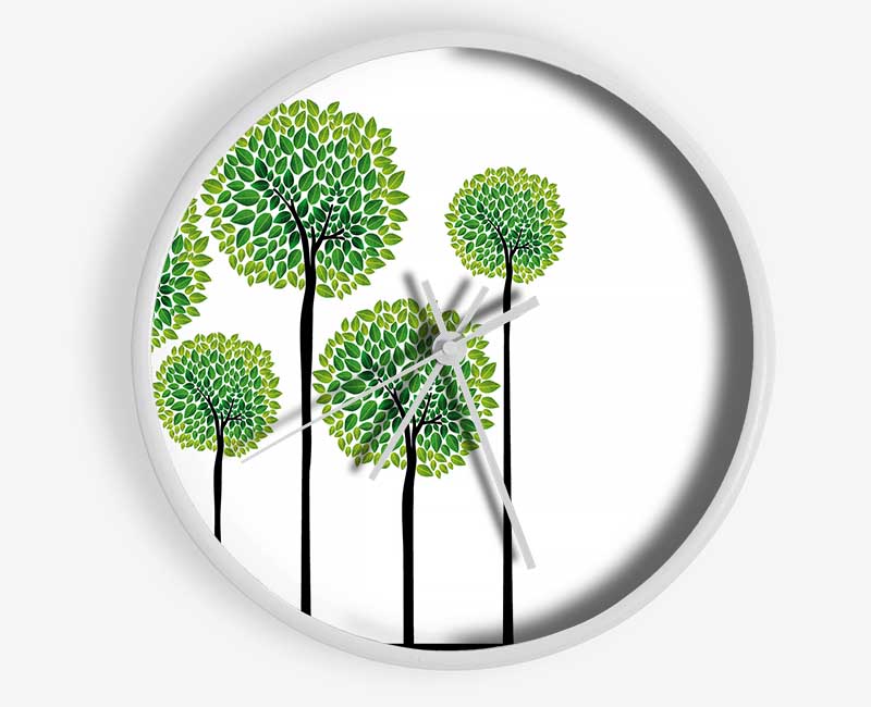 Abstract Trees clock made from natural bamboo with a round face and clear Plexiglas lens, available in black, white, and natural frame colors.