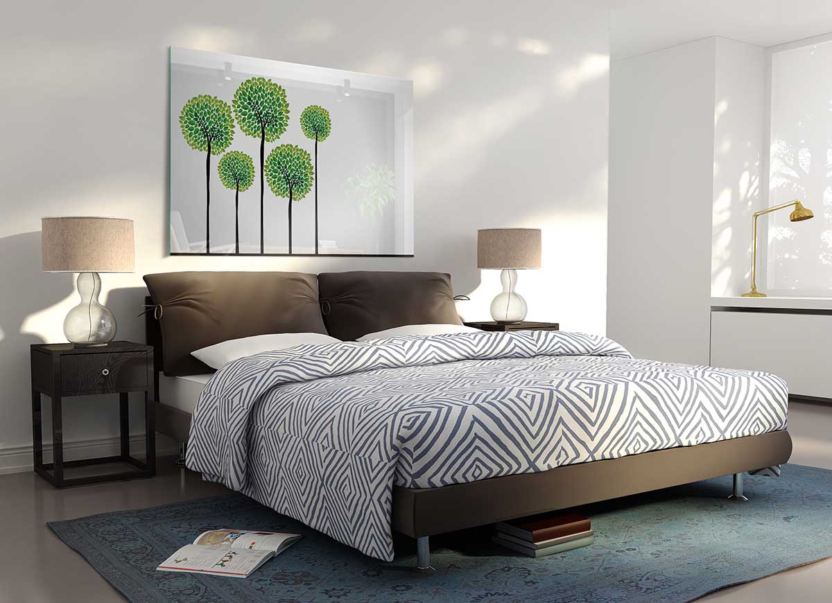 A modern glass print featuring abstract trees, showcasing vibrant colors and intricate details, perfect for home decor.