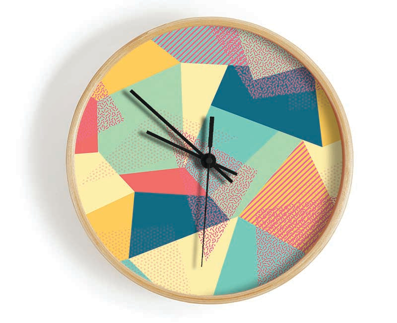 Abstract Triangles clock made from natural bamboo with a round face, available in black, white, and natural frame colors.