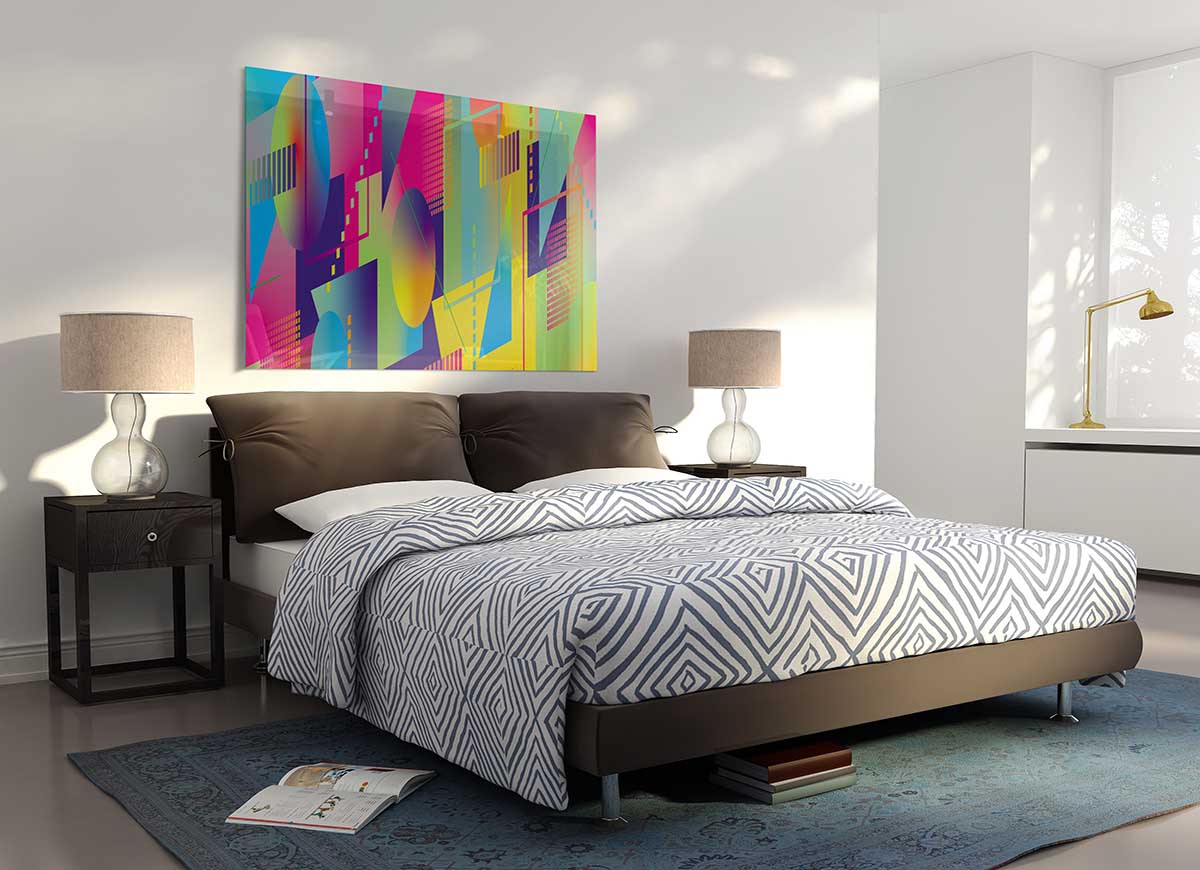 A modern glass print featuring abstract triangles and spheres in vibrant colors, perfect for home decor.