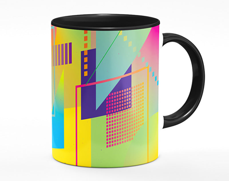 A vibrant Abstract Triangles and Spheres Mug showcasing colorful geometric designs with a polished ceramic finish.